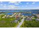Aerial view of the property with waterfront access and manicured lawns at 942 Preservation St, Bradenton, FL 34208