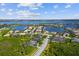 Aerial view of waterfront community with luxury homes and lush landscaping at 942 Preservation St, Bradenton, FL 34208