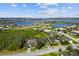 Aerial view of a waterfront community with a bridge and stunning water views at 942 Preservation St, Bradenton, FL 34208