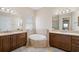 Luxurious bathroom features a soaking tub, dual sinks, and tiled accents at 942 Preservation St, Bradenton, FL 34208