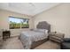 Comfortable bedroom with plush carpeting and large window offering natural light at 942 Preservation St, Bradenton, FL 34208