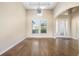 Formal dining room featuring hardwood floors, high ceilings, and neutral decor at 942 Preservation St, Bradenton, FL 34208
