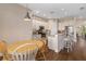 Bright kitchen featuring stainless steel appliances, granite countertops, and dark hardwood floors at 942 Preservation St, Bradenton, FL 34208