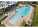 Community pool with plenty of lounge chairs for residents and guests at 942 Preservation St, Bradenton, FL 34208