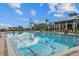 Resort-style community pool offering ample space for swimming and recreation on a sunny day at 942 Preservation St, Bradenton, FL 34208