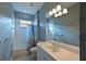 Cozy bathroom with a shower-tub combo, vanity, and modern fixtures at 963 River Wind Cir, Bradenton, FL 34212