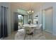 Charming dining room with lots of natural light and modern table with seating at 963 River Wind Cir, Bradenton, FL 34212