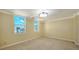 Bright bedroom with neutral walls and carpeted floors at 101 S Gulfstream Ave # 11E, Sarasota, FL 34236