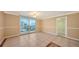 Bright dining room with tile floors and balcony access at 101 S Gulfstream Ave # 11E, Sarasota, FL 34236