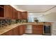 Modern kitchen with granite countertops and stainless steel appliances at 101 S Gulfstream Ave # 11E, Sarasota, FL 34236