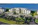 Condo building with covered parking and waterfront views at 1010 Tidewater Shores Loop # 103, Bradenton, FL 34208