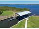 Private boat lift with covered dock and water access at 1010 Tidewater Shores Loop # 103, Bradenton, FL 34208