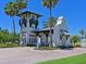 Community entrance with guard house and landscaping at 1010 Tidewater Shores Loop # 103, Bradenton, FL 34208