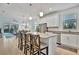 Modern kitchen with stainless steel appliances and granite countertops at 10358 Abaco Falls Dr, Englewood, FL 34223