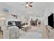 Spacious living area with open concept layout and adjacent dining area at 10358 Abaco Falls Dr, Englewood, FL 34223