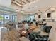 Bright and airy clubhouse lounge with comfortable seating at 10358 Abaco Falls Dr, Englewood, FL 34223