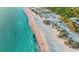 Aerial view of beach with clear water at 10426 Abaco Falls Dr, Englewood, FL 34223