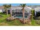 Home with private pool and lush landscaping, in a residential community at 10426 Abaco Falls Dr, Englewood, FL 34223