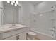 Bathroom with single vanity and bathtub at 10426 Abaco Falls Dr, Englewood, FL 34223