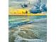 Scenic beach with ocean waves at sunset at 10426 Abaco Falls Dr, Englewood, FL 34223