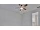 Spacious bedroom with a ceiling fan and access to the bathroom at 10426 Abaco Falls Dr, Englewood, FL 34223