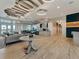Spacious clubhouse lobby with comfortable seating and modern design at 10426 Abaco Falls Dr, Englewood, FL 34223