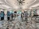 Well-equipped fitness center with cardio and weight machines at 10426 Abaco Falls Dr, Englewood, FL 34223