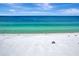 Aerial view of pristine beach and ocean at 1200 E Peppertree Ln # 307, Sarasota, FL 34242