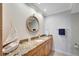 Bathroom with granite countertop and a large vanity at 1200 E Peppertree Ln # 307, Sarasota, FL 34242