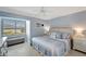 Bedroom with king-size bed and window seat at 1200 E Peppertree Ln # 307, Sarasota, FL 34242