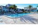 Inviting community pool with lounge chairs at 1200 E Peppertree Ln # 307, Sarasota, FL 34242
