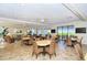 Spacious community room with tables and comfortable seating at 1200 E Peppertree Ln # 307, Sarasota, FL 34242