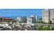 Stunning view of Siesta Key condos, surrounded by lush palm trees and ocean backdrop at 1200 E Peppertree Ln # 307, Sarasota, FL 34242