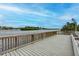 Serene view from fishing pier over calm water at 1200 E Peppertree Ln # 307, Sarasota, FL 34242