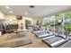 Well-equipped fitness center featuring treadmills and weights at 1200 E Peppertree Ln # 307, Sarasota, FL 34242