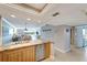 Kitchen with wood cabinets, granite counters and stainless steel appliances at 1200 E Peppertree Ln # 307, Sarasota, FL 34242