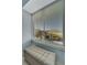 Window nook with seating and blinds offering natural light and city views at 1200 E Peppertree Ln # 307, Sarasota, FL 34242