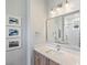 Bathroom with vanity, quartz countertop and shower at 19405 Ganton Ave, Lakewood Ranch, FL 34202