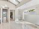 Large bathroom with glass shower and walk-in closet at 19405 Ganton Ave, Lakewood Ranch, FL 34202