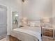 Bedroom with ensuite bathroom and light wood furniture at 19405 Ganton Ave, Lakewood Ranch, FL 34202