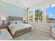 Bedroom with water views and stylish decor at 19405 Ganton Ave, Lakewood Ranch, FL 34202