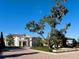 Elegant clubhouse with a grand entrance and manicured grounds at 19405 Ganton Ave, Lakewood Ranch, FL 34202