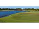 Expansive golf course with a lake and lush green fairways at 19405 Ganton Ave, Lakewood Ranch, FL 34202