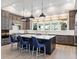 Modern kitchen with island, stainless steel appliances, and ample counter space at 19405 Ganton Ave, Lakewood Ranch, FL 34202