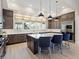 Gourmet kitchen with large island, stainless steel appliances, and ample counter space at 19405 Ganton Ave, Lakewood Ranch, FL 34202
