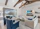 Open living space with high ceilings, fireplace, and pool view at 19405 Ganton Ave, Lakewood Ranch, FL 34202
