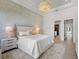 Spacious main bedroom with neutral decor and en-suite bathroom access at 19405 Ganton Ave, Lakewood Ranch, FL 34202