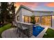 Enjoy this refreshing pool with a bar and seating at 213 83Rd St # West, Holmes Beach, FL 34217