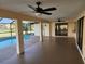 Covered patio with pool and backyard views at 25484 Terrain Ln, Punta Gorda, FL 33983