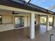 Covered patio with pool and backyard view at 25484 Terrain Ln, Punta Gorda, FL 33983